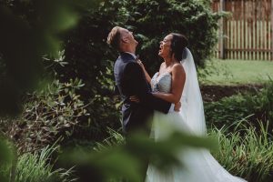 laughing-couple-wedding-the-old-stables-leicester